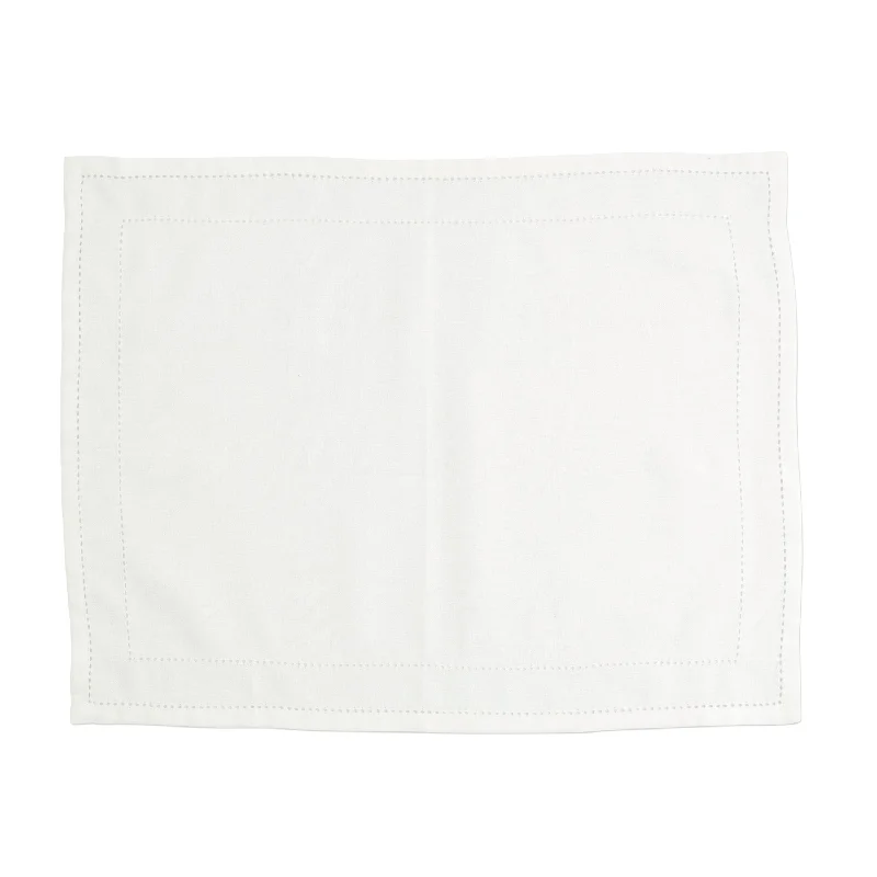 affordable-staycation-ideas-Cotone Linens Ivory Placemats with Double Stitching (Set of 4)