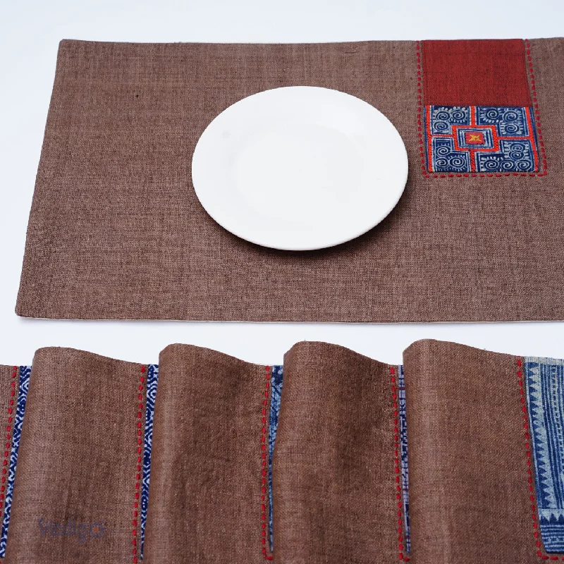 how-to-learn-seo-analytics-Dark brown hemp placemat, hand-embroidered patch, hand stitches